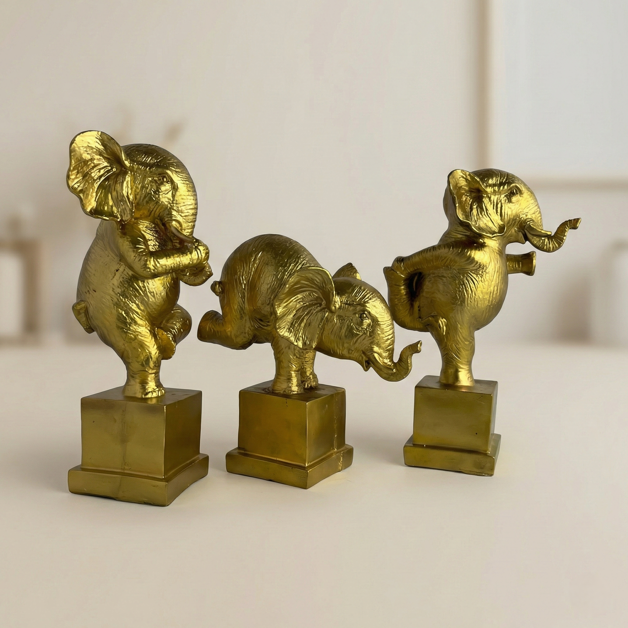 Gemini_Generated_Image_o1k336o1k336o1k3 TCG 9" Yoga Posture Elephant Set Golden - Image 1