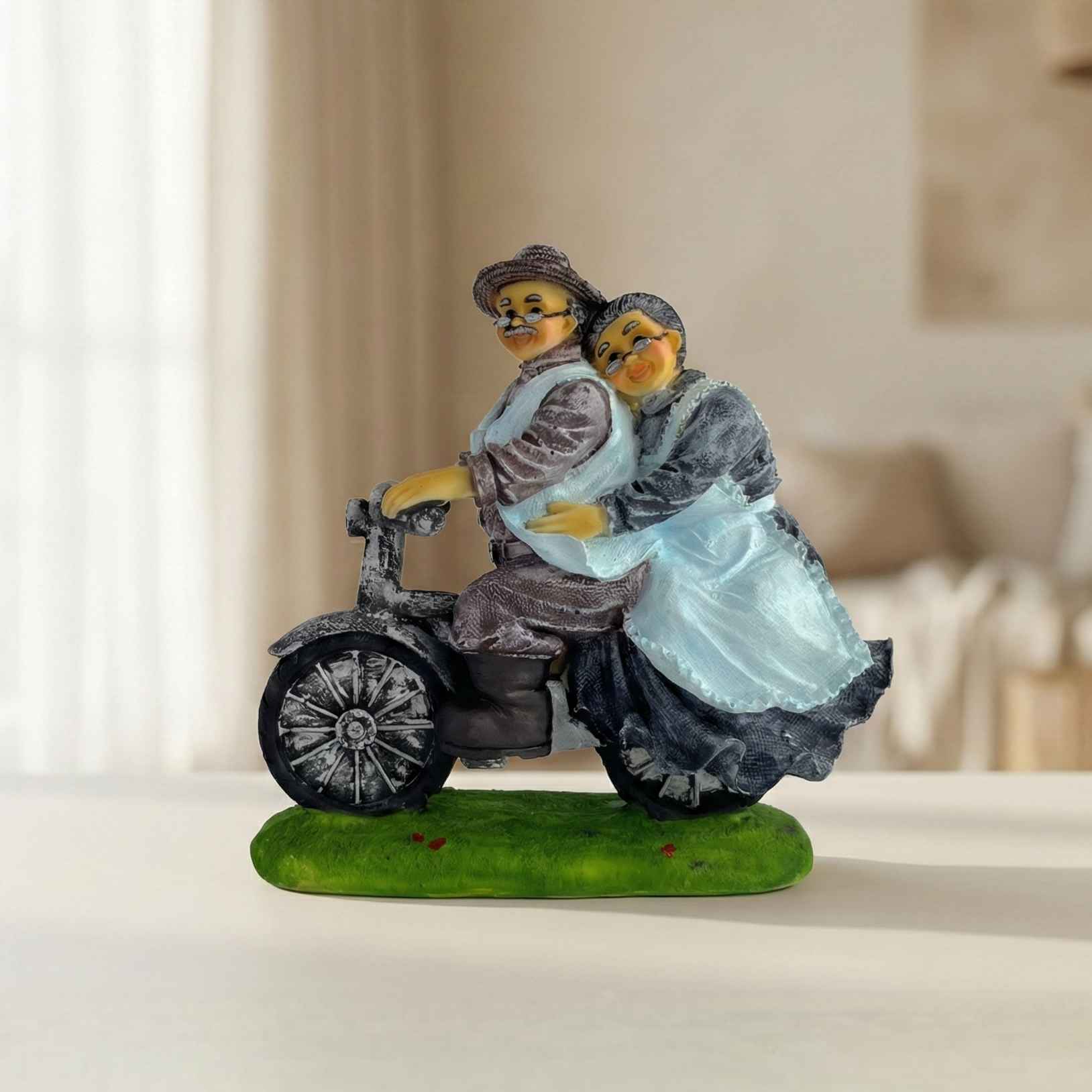 Made with LogoLicious Add Your Logo App TCG 8.2" Dada Dadi Statue Riding Bike - Image 1